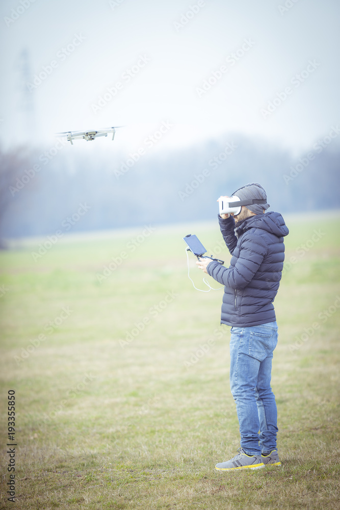 Young man with drone and virtual reality viewer
Young man with drone and virtual reality viewer