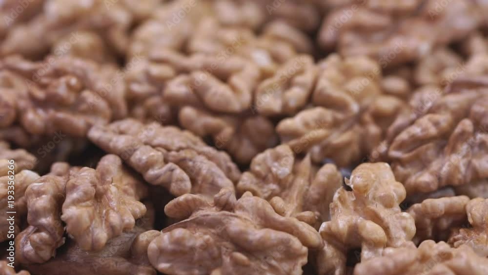Walnut closeup. Rotating nuts background Walnut closeup. Rotating nuts background