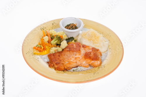 roasted salmon fillet with vegetables and potato puree