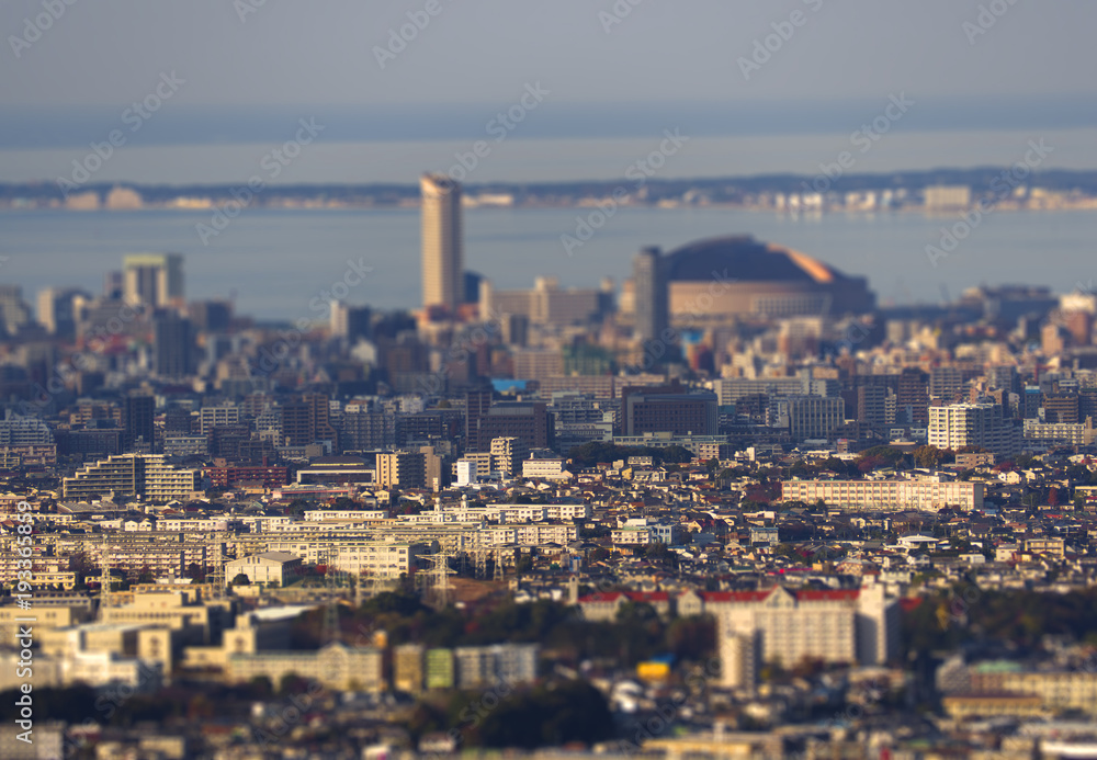 Aerial landscape of Fukuoka city in Japan, with the sea in the background