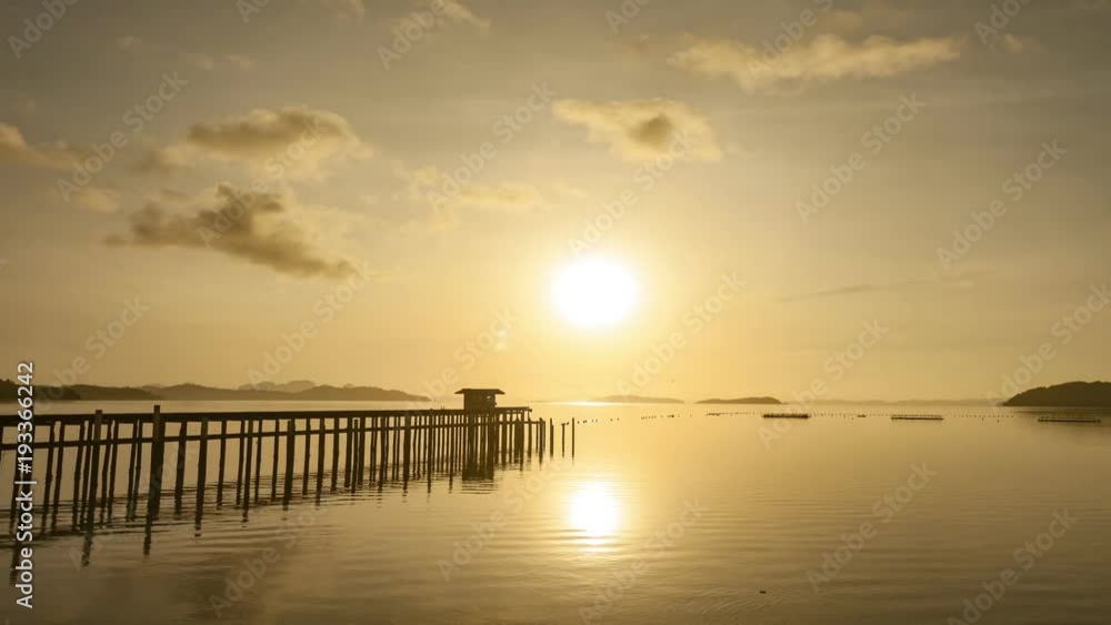 old small jetty in to the sea in sunrise or sunset evening time old small jetty in to the sea in sunrise or sunset evening time