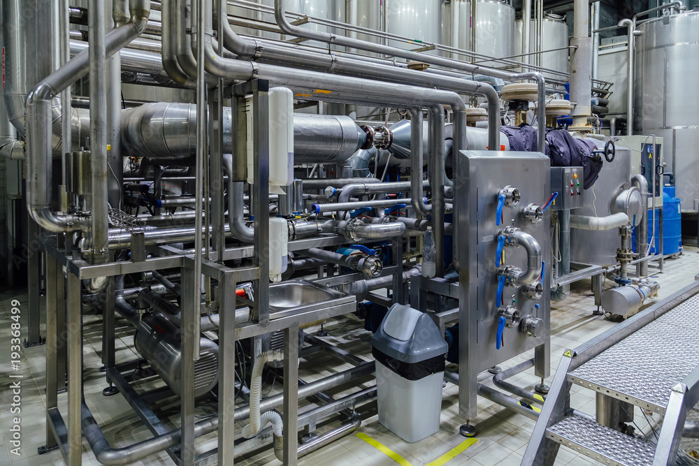 Industrial stainless steel pipeline connected with vats and control valves Industrial stainless steel pipeline connected with vats and control valves