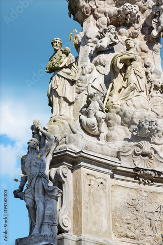 Kremnica - The Safarikovo square and detail of the baroque Holy Trinity column with the St. Sebastian and St. Joseph by Dionyz Ignac Stanetti (1765 - 1772).