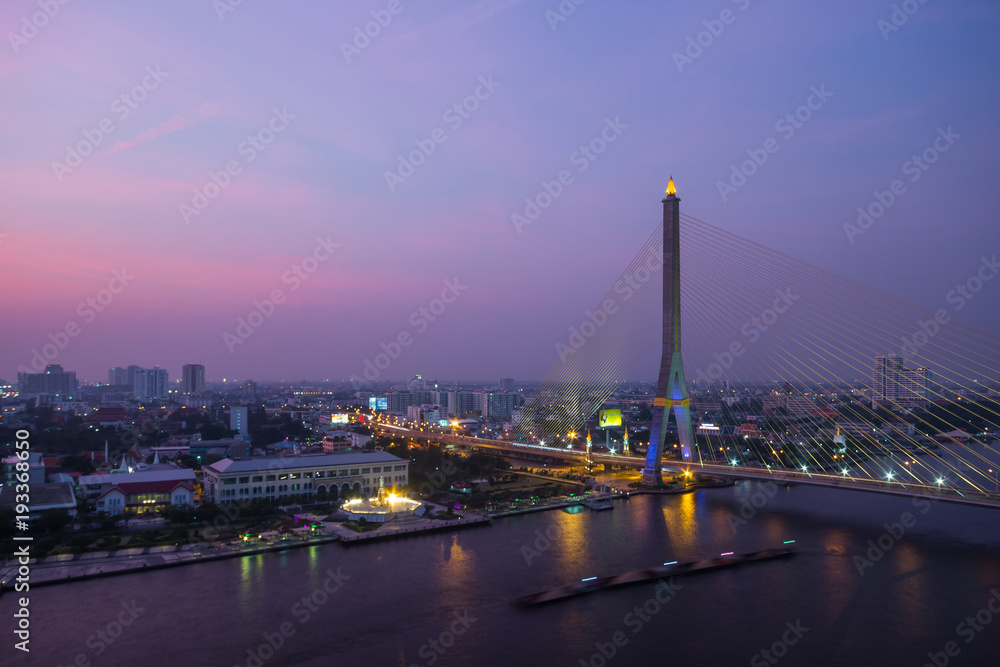 After sunset at Rama VIII Bridge in Bangkok and Chopraya river, Thailand