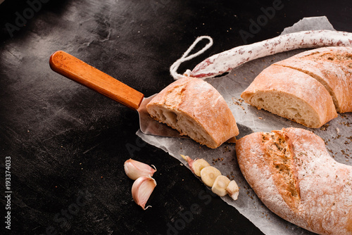 Traditional Galician white bread with moldy salami photo