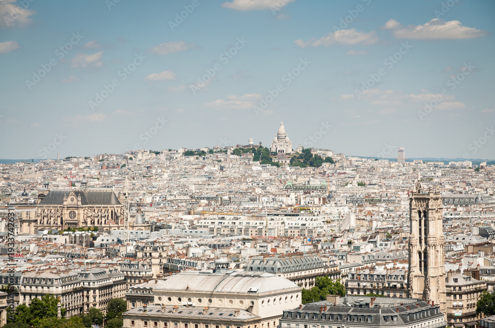 Aerial view of Paris with Sacre-Couer on background
