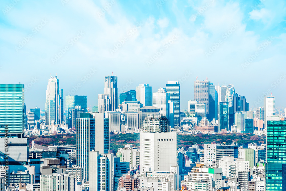 Obraz premium Asia Business concept for real estate and corporate construction - panoramic modern city skyline aerial view of Shinjuku area under blue sky in Tokyo, Japan
