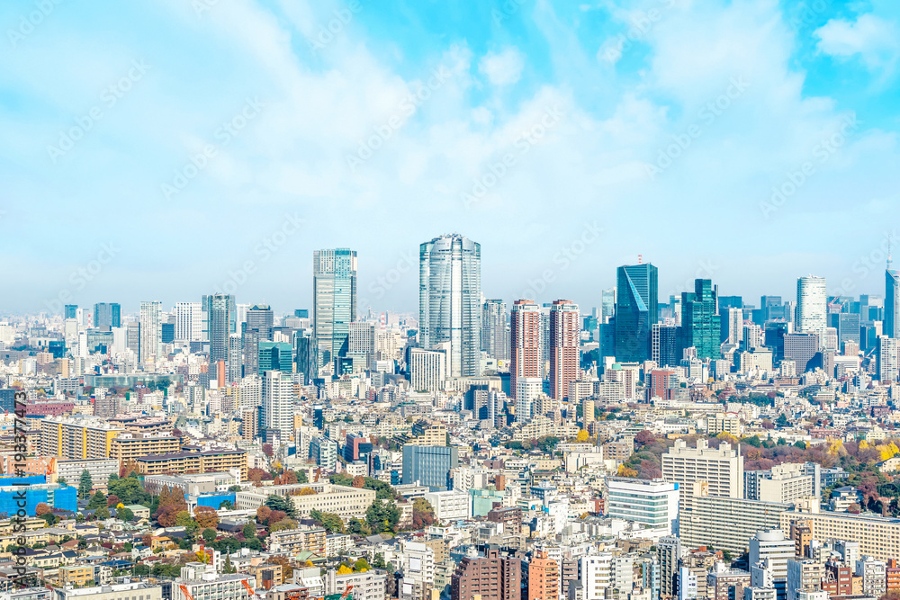 Asia Business concept for real estate and corporate construction - panoramic modern city skyline aerial view of Roppongi hill under blue sky in Tokyo, Japan.