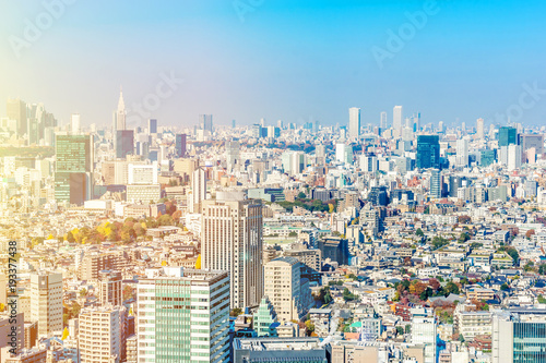 Asia Business concept for real estate and corporate construction - panoramic modern city skyline aerial view of Shinjuku area under blue sky in Tokyo  Japan