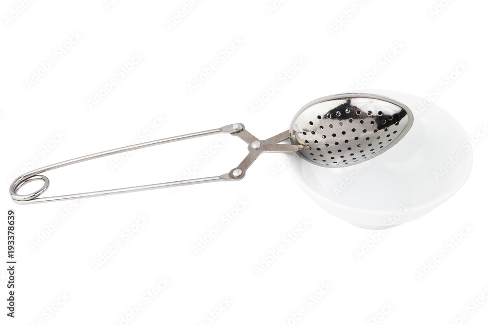 Tea strainer on a chain isolated white background. Tea strainer on a chain isolated white background.