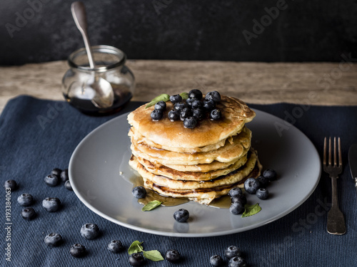 american pancake stack with blueberry topping