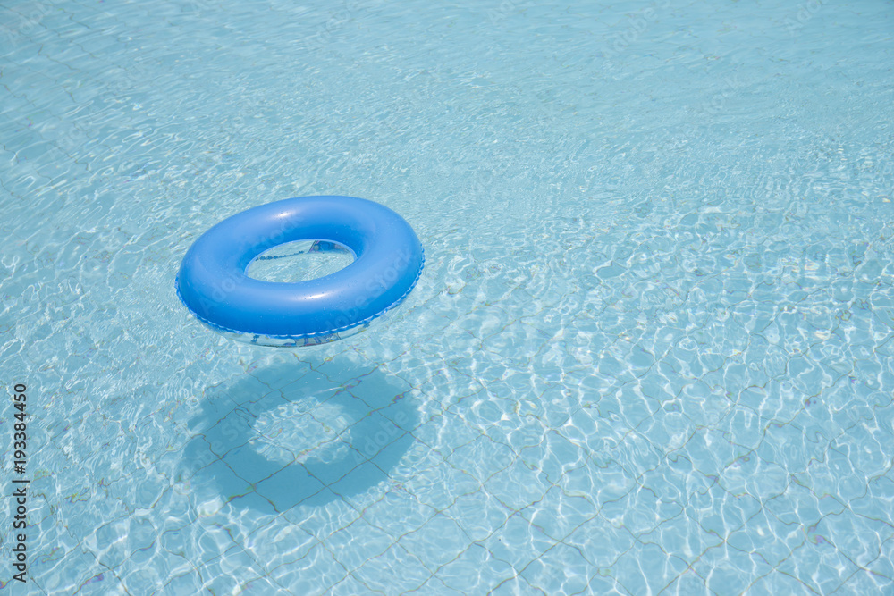 blue swim ring for children float on swimming pool isolated Stock Photo Adobe Stock