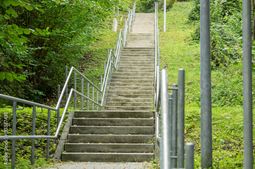 Fototapeta Naklejka Na Ścianę i Meble -  A staircase in the middle of the park