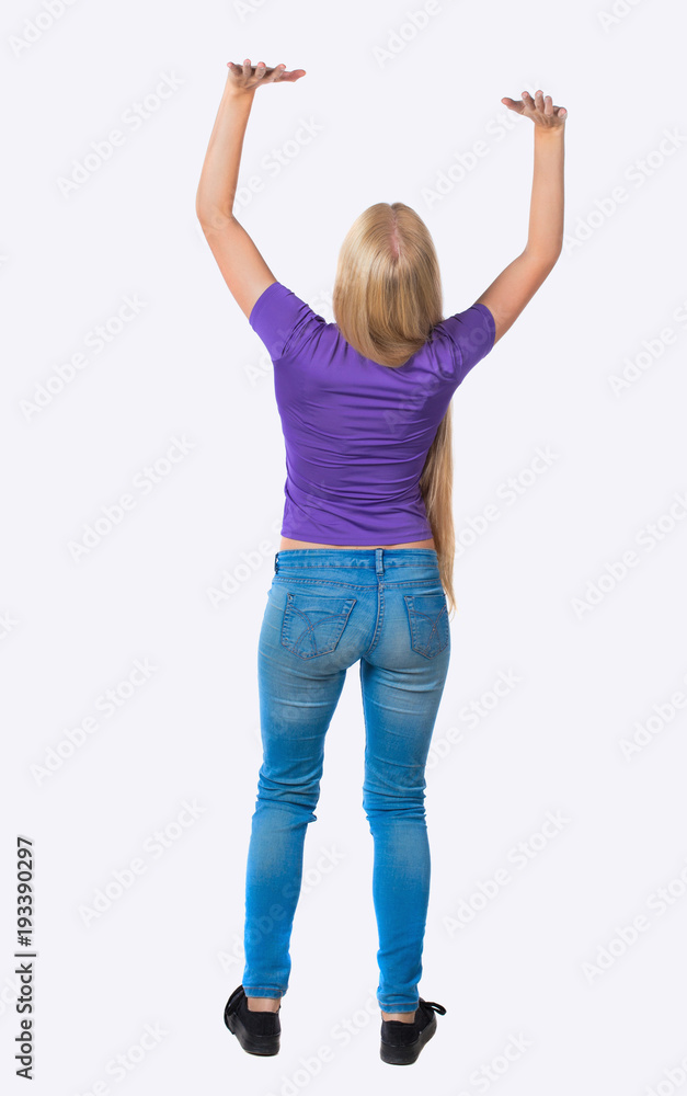 back view of woman pushes wall. Isolated over white background. back view of woman pushes wall. Isolated over white background.