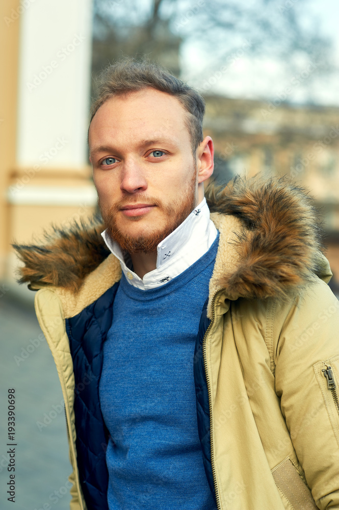 Portrait of a young man in the city