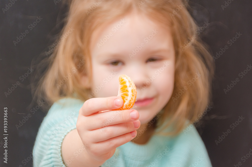 baby girl vegetarian with mandarin slice baby girl vegetarian with mandarin slice