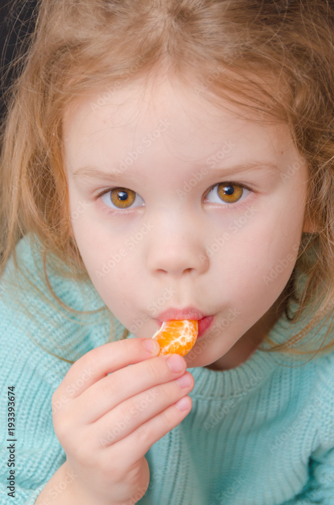 baby girl vegetarian with mandarin slice baby girl vegetarian with mandarin slice