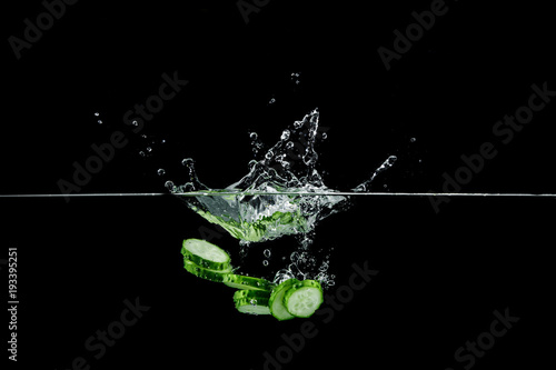 cucumber in water with splash