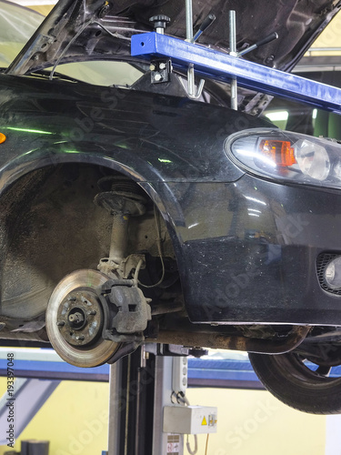 Car in a car repair station photo