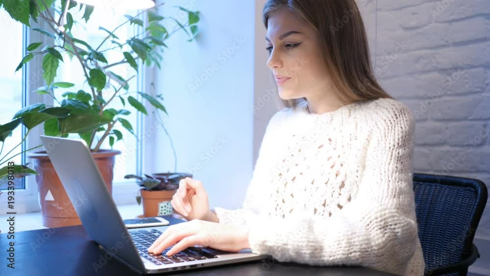 Web Video Chat on Laptop by Young Female, Sitting In Office Web Video Chat on Laptop by Young Female, Sitting In Office