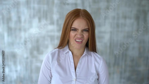 portrait of young woman. body language gestures. she disgusted. skeptical girl rejects, disagreement emotion facial expression people concept, saying no, dislike, rejecting gesture