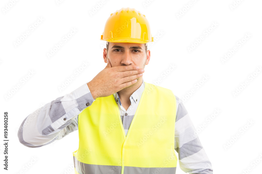 Constructor or builder covering his mouth. Constructor or builder covering his mouth.