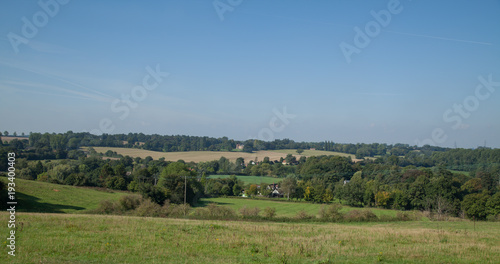 landscape photo of a country scene with a clear blue sky on a summers day