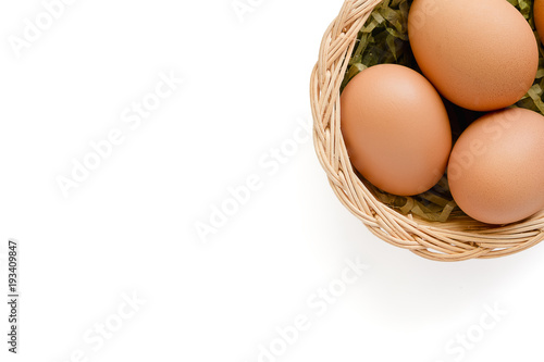 Eggs in the wicker basket o...