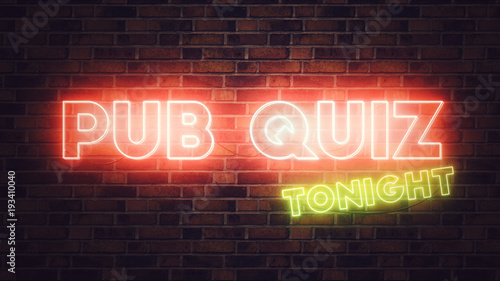 Pub Quiz neon sign mounted on brick wall photo