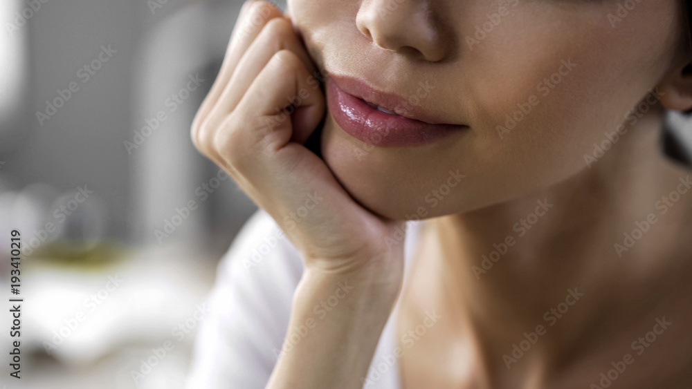 Dreaming pretty woman with hand on chin, freshness and purity, cosmetology Dreaming pretty woman with hand on chin, freshness and purity, cosmetology