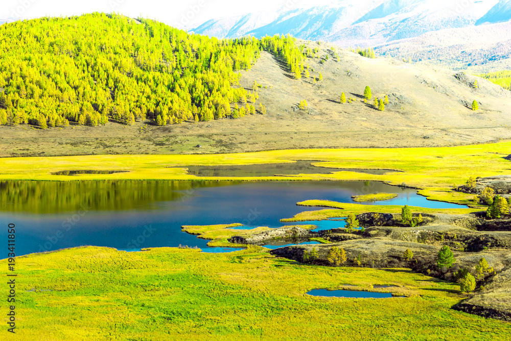 View of the Sunny mountain valley with lakes and rivers. Journey through the Altai Republic.