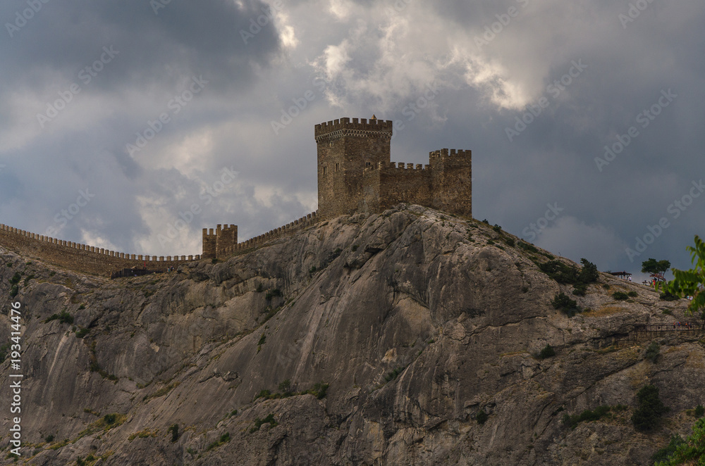 Beautiful Genoese fortress built on rocks above sea in Sudak city of Crimea.