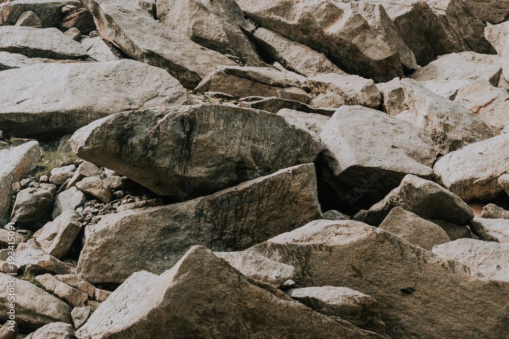 Stones and cobblestones close up. The rocks in the mountains. Stones and cobblestones close up. The rocks in the mountains.