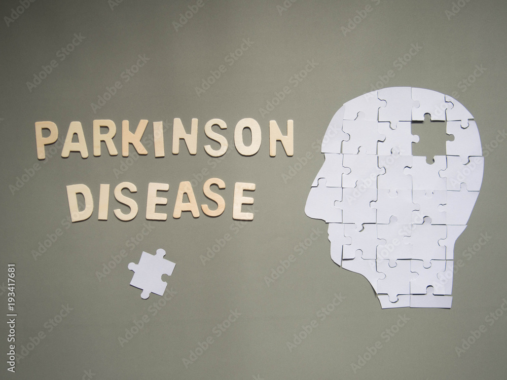 Parkinson's disease presented by head brain white puzzle w/ missing