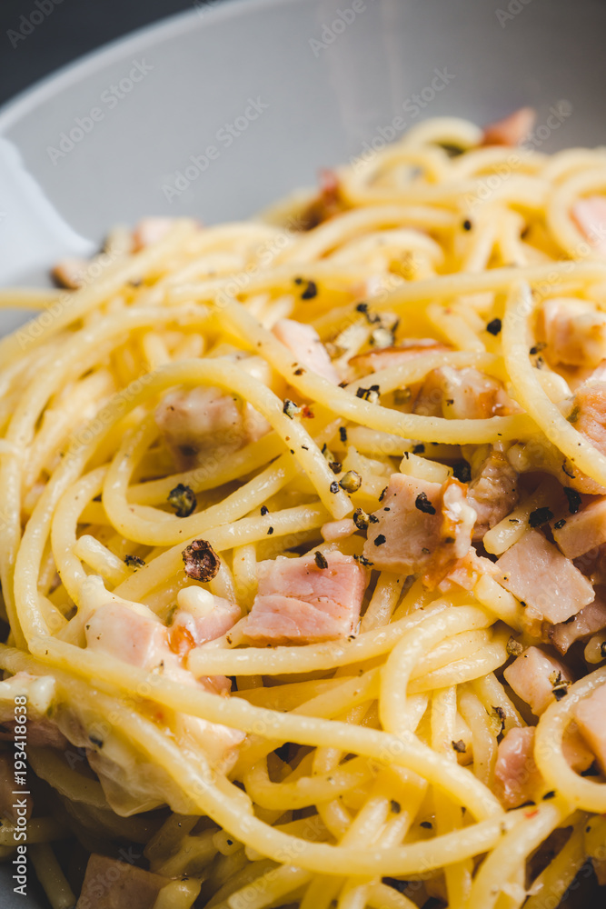 Tasty pasta with bacon and cheese. Selecitve focus. Tasty pasta with bacon and cheese. Selecitve focus.