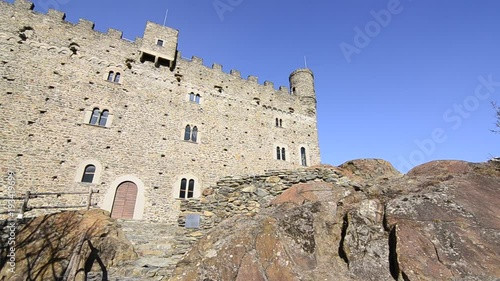 Ussel fraction of Chatillon, Valle d'Aosta, Italy 11 February 2018. Film of the facade of the medieval castle of Ussel. Camera movement from right to left. photo