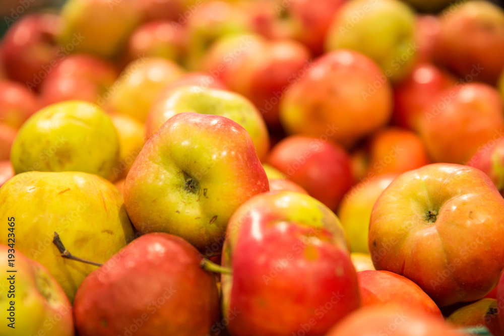 Yummy pile of apples in a market stall Yummy pile of apples in a market stall