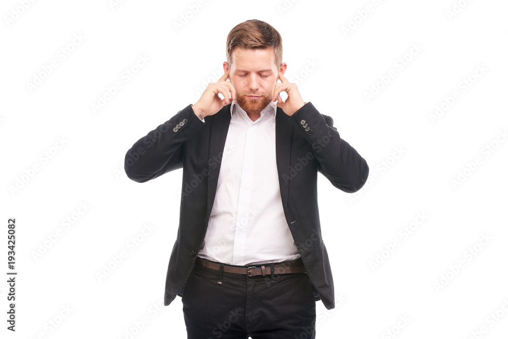 Portrait of young Caucasian businessman in black suit and white shirt posing on white background Portrait of young Caucasian businessman in black suit and white shirt posing on white background