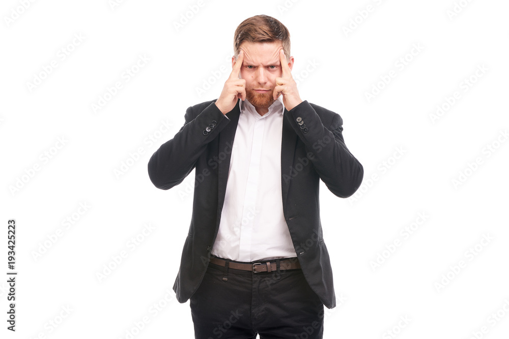 Portrait of young Caucasian businessman in black suit and white shirt posing on white background Portrait of young Caucasian businessman in black suit and white shirt posing on white background