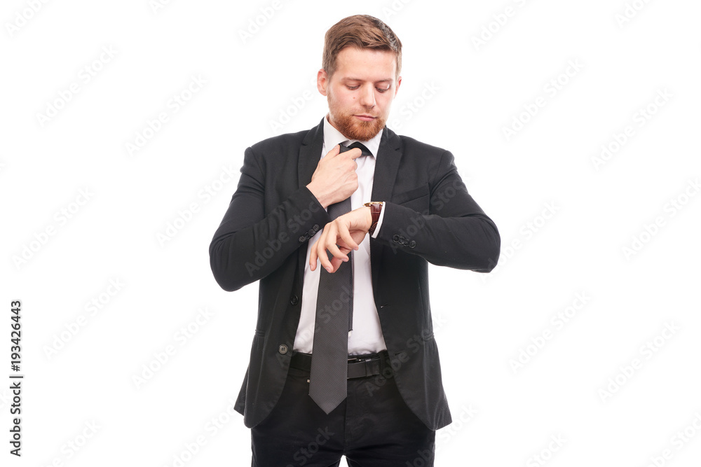 Portrait of young businessman wearing suit, white shirt and necktie Portrait of young businessman wearing suit, white shirt and necktie