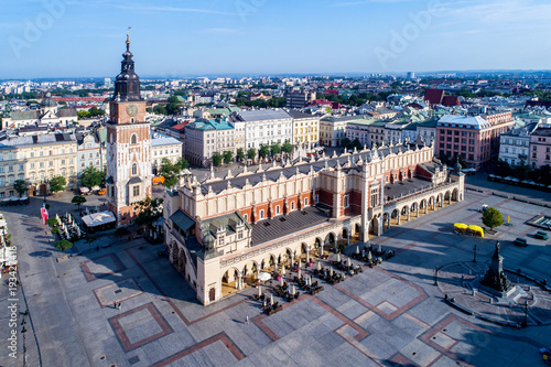 Wallpaper Mural Krakow old city in Poland with Main Market Square (Rynek), old cloth hall (Sukiennice), town hall tower and renovated Mickiewicz statue.  Aerial view Torontodigital.ca