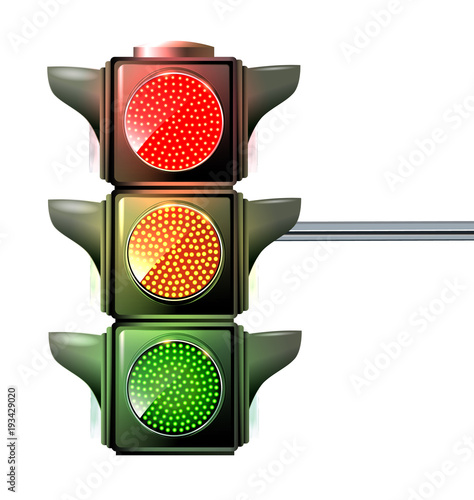 At a traffic light the three colors light up red, yellow and green at the same time.
