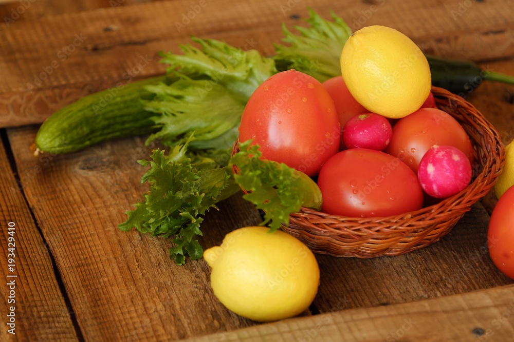 Summer vegetables and fruits on a wooden table Summer vegetables and fruits on a wooden table