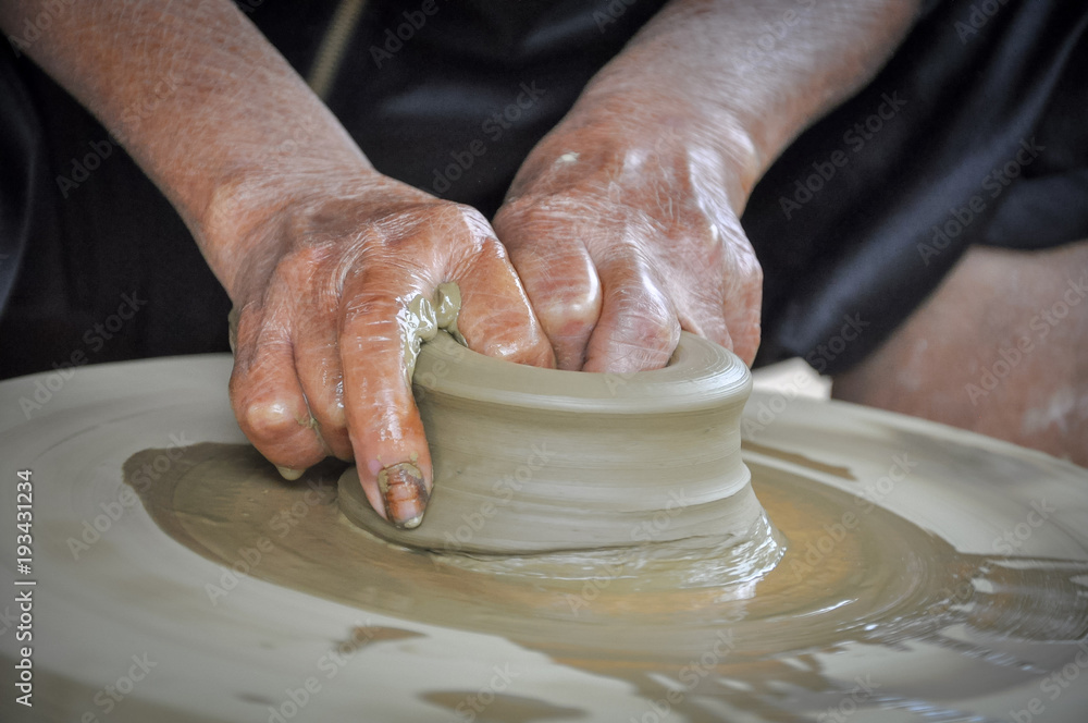 hands of a woman going to make pottery at home