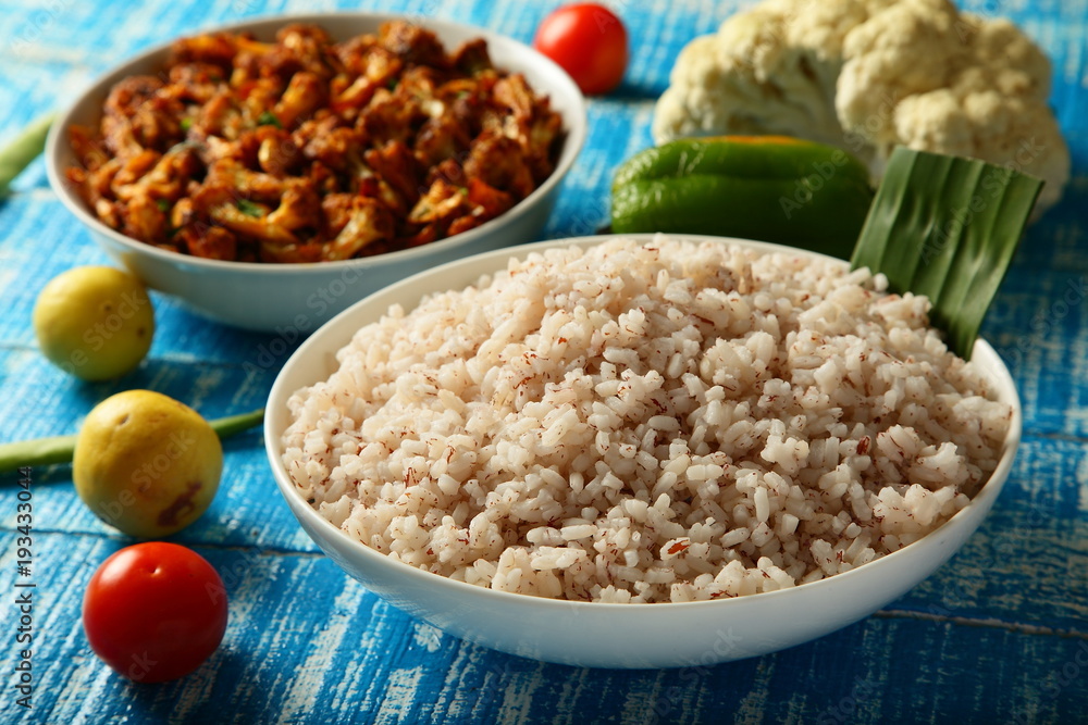 Healthy diet- cooked rice with bran and vegan roast curry dish Healthy diet- cooked rice with bran and vegan roast curry dish