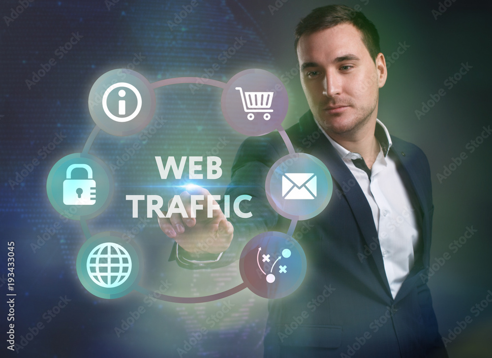 Business, Technology, Internet and network concept. Young businessman working on a virtual screen of the future and sees the inscription: Web traffic Business, Technology, Internet and network concept. Young businessman working on a virtual screen of the future and sees the inscription: Web traffic