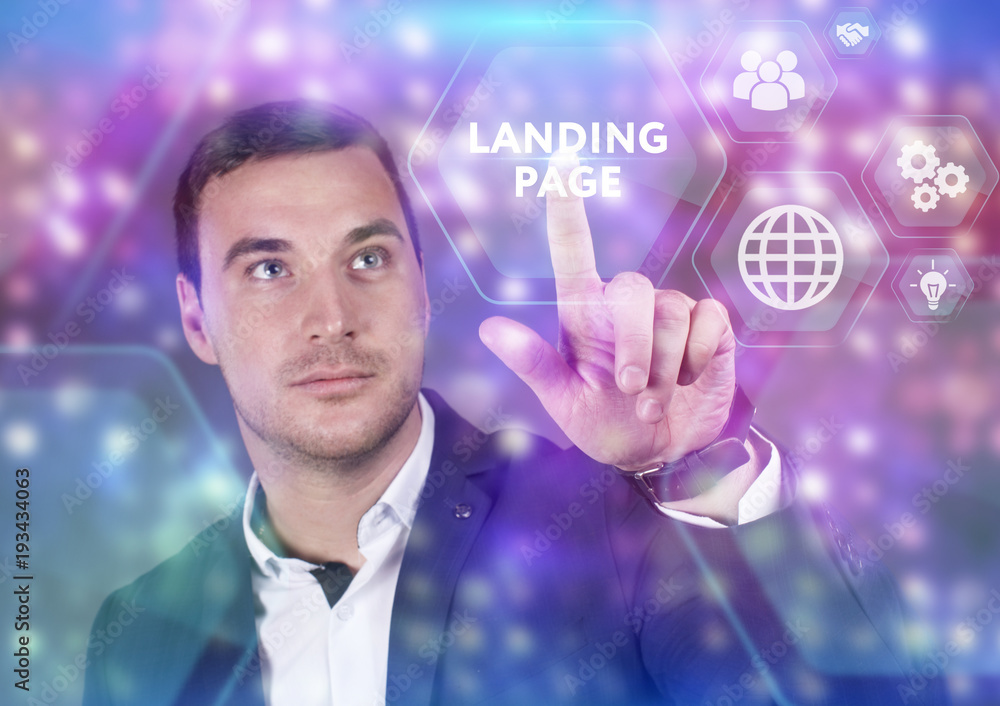 Business, Technology, Internet and network concept. Young businessman working on a virtual screen of the future and sees the inscription: Landing page Business, Technology, Internet and network concept. Young businessman working on a virtual screen of the future and sees the inscription: Landing page