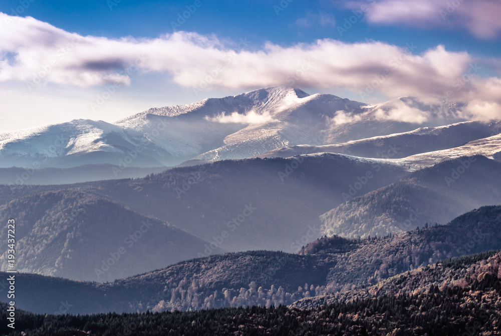 Fototapeta premium Mountains sunset and fog landscape.