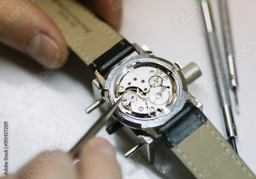 Close up of wrist watch repairing