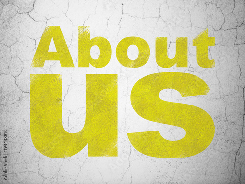 Marketing concept: Yellow About Us on textured concrete wall background